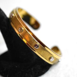 Vintage Henri Bendel Gold Tone Silver Screws Cuff Gently Used 6 Inch Bracelet